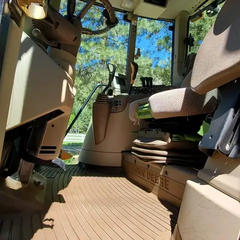 Clean cab interior of an excavator after detailing