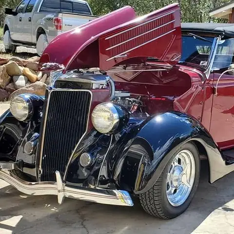 Black and red 1930s hot rod after detailing