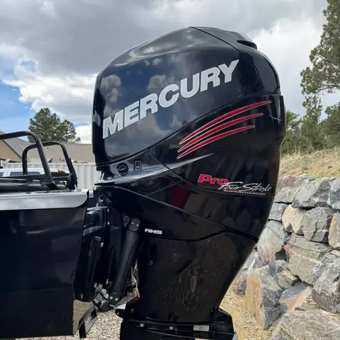 Glossy black Mercury Pro FourStroke outboard motor after detailing