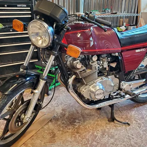 Red vintage motorcycle cleaned and polished